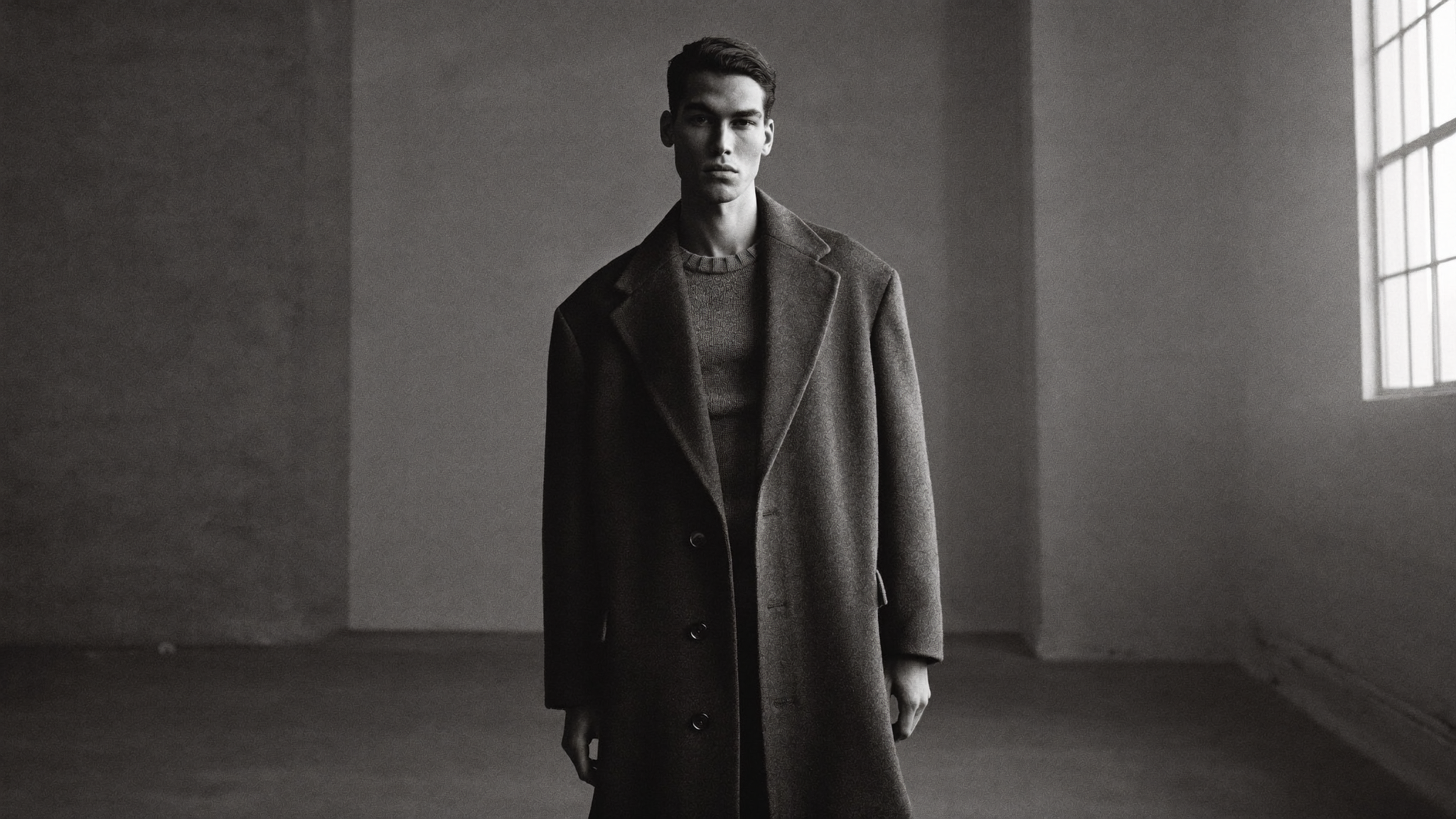 THE MODERN DAY — wool overcoat worn over knitwear, editorial campaign image